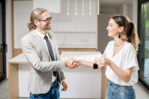Happy young woman buyer standing with realtor receiving keys of a new apartment. New apartment purchase concept SSUCv3H4sIAAAAAAAACpxWyW7zNhC+F+g7BDqXAPelr1L0QHGJhciioCWBEeTdO5IsRSb9N0UvhjXzcTbODL/P3397ealqOzau+vPlc/mC76Zt53Ea7NSkDsT4j7t8CJ0Pw1nyPjCJz4LgmykNjW3PwtpO7tLZawBhN7ftIv5aldU42Wkew3jyTigbInyz/bht7fV2Fvgh2Os4NavBQxrG/vwZ05Taxp5F42WepjCMU3JvDw58qsMhPUXn7BReIZ2H+PZq/bV9v+yKVQknQFVVd9Ob27leZbtoM/6/Tm5//j4Cfw2dW0rz+XWKeghtsFtN7zFWQRgWsJHIeEIR59IgazX8kOClU5FwaXfPlahrIYIjiGmAcAP/au00UhJzxT3WJroDXCvFlXUcBTiDuJcBaYcVYoEFQRxAZTzAkVhuo45IugCWLfGo5lggSTljtbWSEXKAlebC1REjrmhEnEaNDKcEWa+ldSKQaMUBDjoSibVH2CkCYRCCDGMKGaJ0hLPgFR9gSykW3hMUcVCISwDbWFNEPRVc1Uoy920ZYxqVoBh5wWvEtYWqRaYhBemw4FrQmq4XtN1K9fYBLXY9N8wlrY169EtFMNFKV9llXhIMwgNOYihMDuvCxyOIUl2AbG+H6Rq6qbAnc+gtzd3rI0xRUUZn+/6WWSNS5LA+pL7Ns8C4CLDpfErDmAGFwTnwI11t9wAzUugC9gQkSA6CGYeBLkpiyuDgCps0/BzdNQ3TK0zhA5ISYSQtKjOkPgzTYw0JZpKyIudLk4dJiS5qfU2wjbuiGQpzMVxtdidQHlWk7dqm6BiJVWHvLdyyi5OkRMGObuEpeAQSzoo0liU2/QxrU3bFmssyVwcPF4zb8HMW9ZDechyRssTNtyYfEOiZohU85Js1DCPmibUiuCfGmu4dmrUYYKVN2dX1PDZdGPNZ4qZApo8udy6UlE9mCe4kL40gRWn6eXAXeGl+zselbpzbyRYLiWGVY8fQts8qXqRzsZ0fL/Yt809gWHbo6VW0s2/SaSu/J2fbMXvw+6Fxm+/PuyRNl7UU+zEH63IalimGOTfHK9Gm1Nt6nbIIZsN3jOMIJ/wuP/naWvXkqkvT+mjfOUDlt2VVEUY1xZxTCs8frCF1f8nu5OnSgJ01oj3GuYdh8WFxejCMnPwQAZvCaMLpQThOlGnRCs6V2jlczroWAEwVxfobsPO0XUdPh3dSd+jEt24jbptGGy43xc6SFhJ0bSD0/5COkeKX6UAHAXv5t3QYlup5WIzAuvxFMlxptjPJrAhGMyzW9rpTt4P0QtCNXznCXdQs2VUawzGiauShsIhjAmTKCw3cSnvjXayjX1r76x8AAAD//wMAkGnZg7cLAAA=